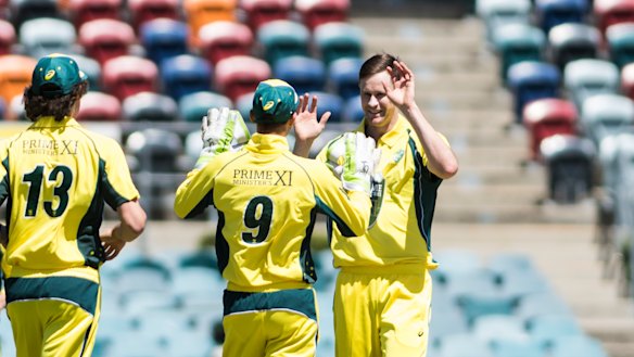 Jason Behrendorff and the PM's XI.
