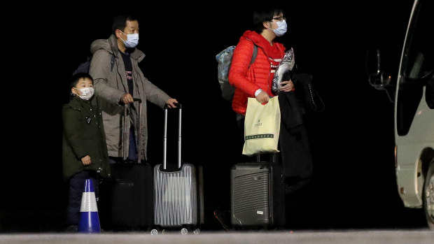 Australians evacuated from Wuhan arrive on Christmas Island on Thursday.
