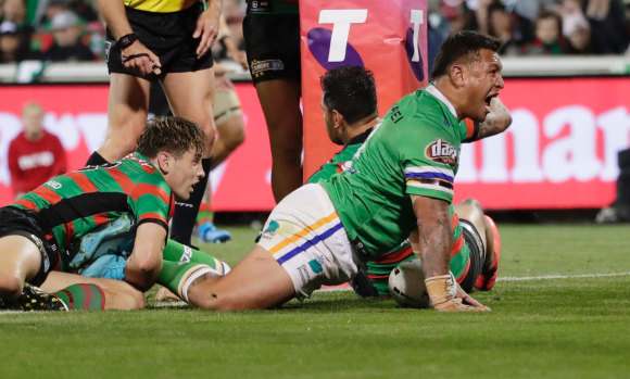 Raiders forward Josh Papalii crashes over for the match-winning try at GIO Stadium on Friday night.