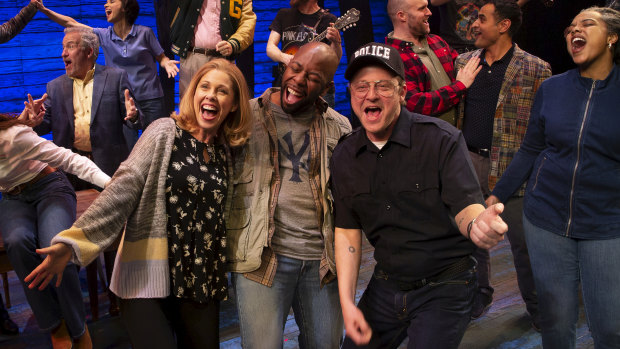 Come From Away cast with Simon Maiden, front right.