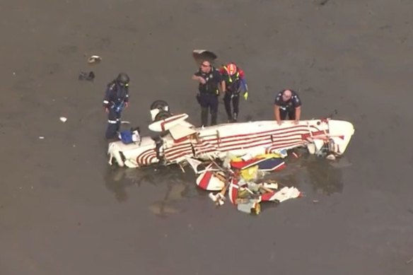 The wreckage of the plane in Pumicestone Passage west of Bribie Island. 