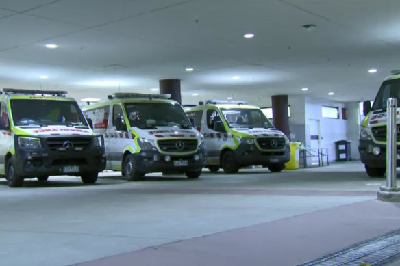 Ambulances waiting to offload patients at the Royal Melbourne Hospital on Thursday night.