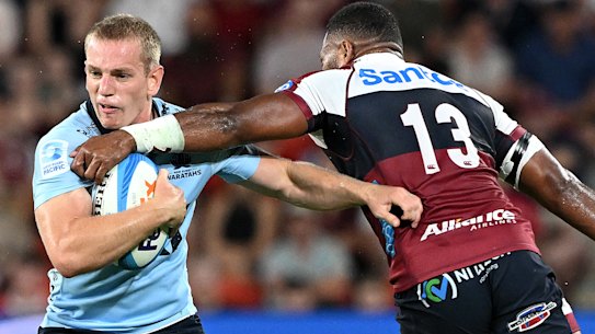 Max Jorgensen takes on the Reds defence.