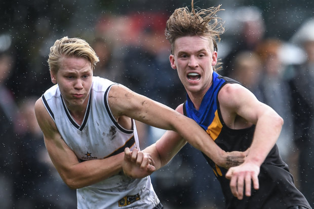 Noah Anderson (right) is set to join his best mate and Carey teammate Matt Rowell at Gold Coast.