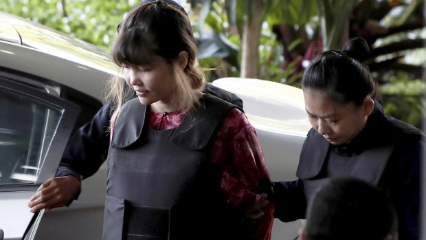 The trial of Vietnamese Doan Thi Huong, left, is on hold following the withdrawal of charges against her co-accused Siti Aisyah.