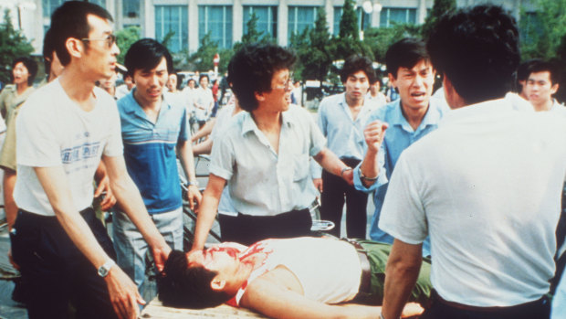 Injured protester in Tiananmen Square in 1989. 