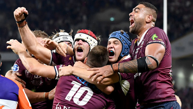 Queensland celebrate an extraordinary Super Rugby AU win at Suncorp Stadium.