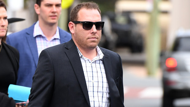 Former Dreamworld employee Joe Stenning leaves after giving evidence in the inquest.
