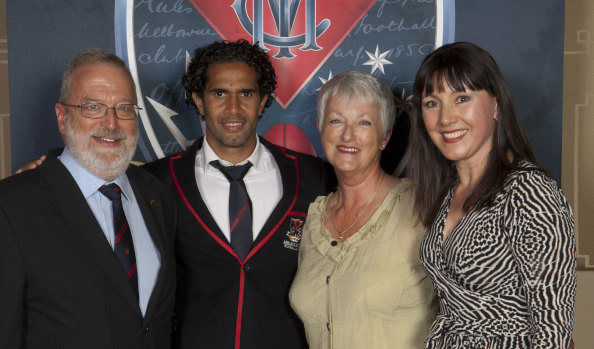 Melbourne supporter Penny Mackieson (right), who sponsored former Demon Aaron Davey (second from left).