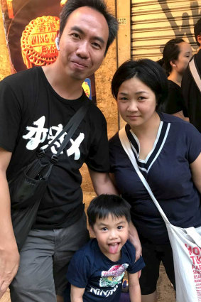 Maggie Leung, right, with her son Bosco, 5, and er husband Victor Yeung. They marched two Sundays in a row against the Hong Kong extradition law. 