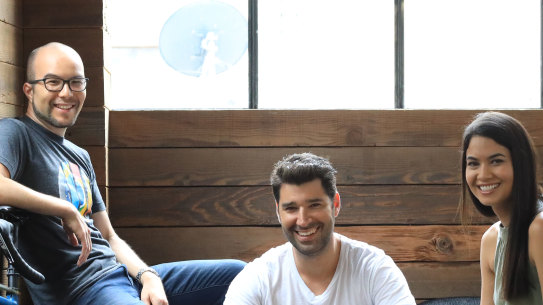 Cliff Obrecht and Melanie Perkins with Cameron Adams (left), Canva’s third co-founder.