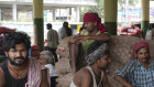 Workers in a wholesale market in Hyderabad. Accelerating industrial transformation and rapid East Asian-style economic growth is achievable given the right trade and investment strategies.