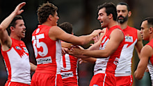 Logan McDonald celebrates with Charlie Curnow.