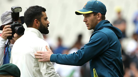 In need of a lift: Paine shakes hands with Virat Kohli after defeat in the third Test.