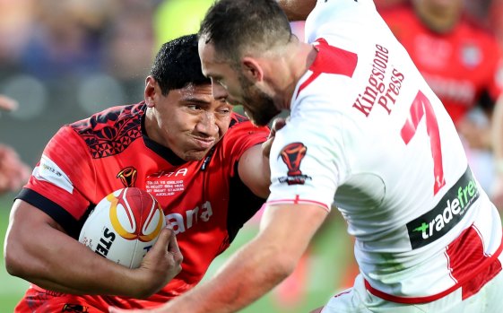 Don't argue: Jason Taumalolo shoves England halfback Luke Gale out of the way. 