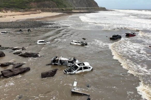 Cars washed out to sea near Lorne on January 16. Flash flooding is possible after the forecast heatwave.