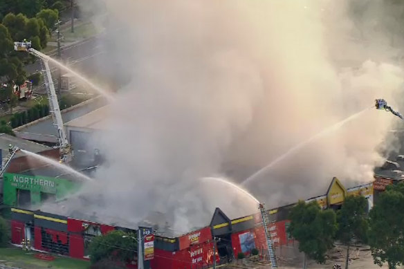 Aerial shots of Epping fire at a homemaker centre. 