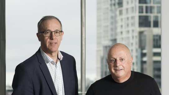 Cbus Property boss Adrian Pozzo and Chris Lucas with the model of 435 Bourke Street.