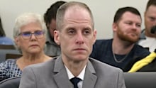 This image taken from pool court video shows 40-year-old Caleb Flynn listening to the judge reading out the jury’s verdict at the Miami County Court of Common Pleas.