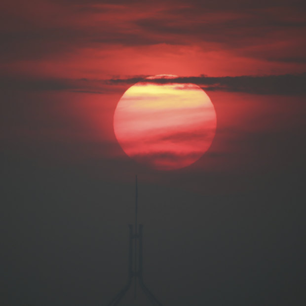 Bushfire smoke clouds Canberra during the Black Summer fires. Six out of 10 Australians say they are concerned about global warming, but many are unaware of the decline of nature.  