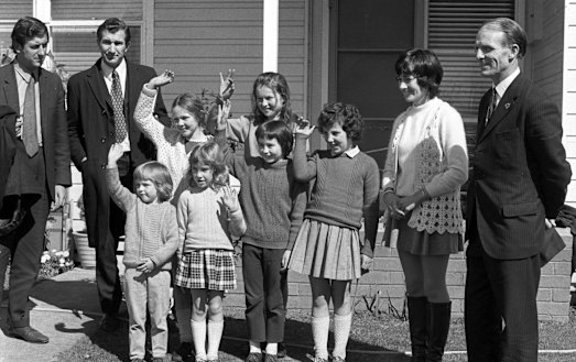 Victorian education minister Lindsay Thompson with Mary Gibbs and her six pupils after their rescue from kidnappers.  