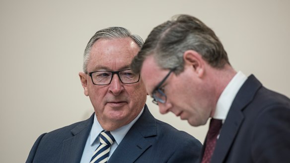 NSW Health Minister Brad Hazzard and NSW Treasurer Dominic Perrottet in Sydney on Thursday.