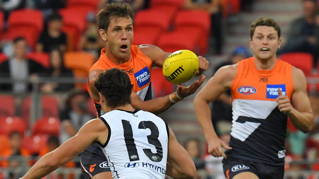Forward march: Greater Western Sydney's Jeremy Cameron moves the ball on under pressure during the round 9 clash against Carlton at Giants Stadium in Sydney.