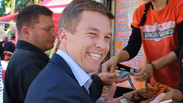 Julian Simmonds says he will not stand down from his portfolio following his preselection for the federal electorate of Ryan.