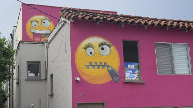 Painted emoji are seen on a house in Manhattan Beach, California.