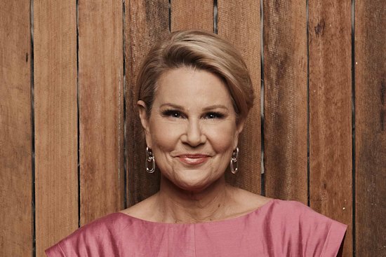 Julia Morris loves mixing a red carpet gown with a pair of sneakers.