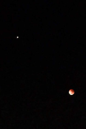 The red moon was joined by a radiant Mars.