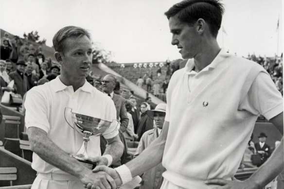 Roy Emerson congratulates Rod Laver on his French Open singles title.