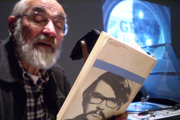 Behind a microphone, where he has, in one way or another, been a fixture for decades. 