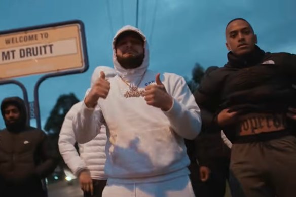 Lorenzo Lemalu (right) in a music video with rapper Ay Huncho, whose legal name is Ali Younes.