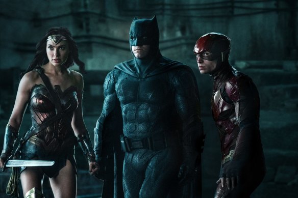 Gal Gadot, Ben Affleck and Ezra Miller in a scene from the original Justice League.