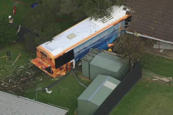 A bus veered into two homes after being involved in a truck crash at Safety Beach.