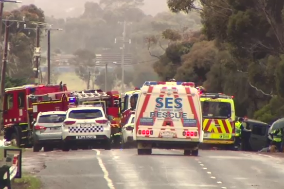 Emergency service vehicles attend a fatal collision at Diggers Rest on Tuesday