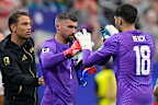 Mat Ryan (centre) replaced Patrick Beach ahead of the penalty shootout.