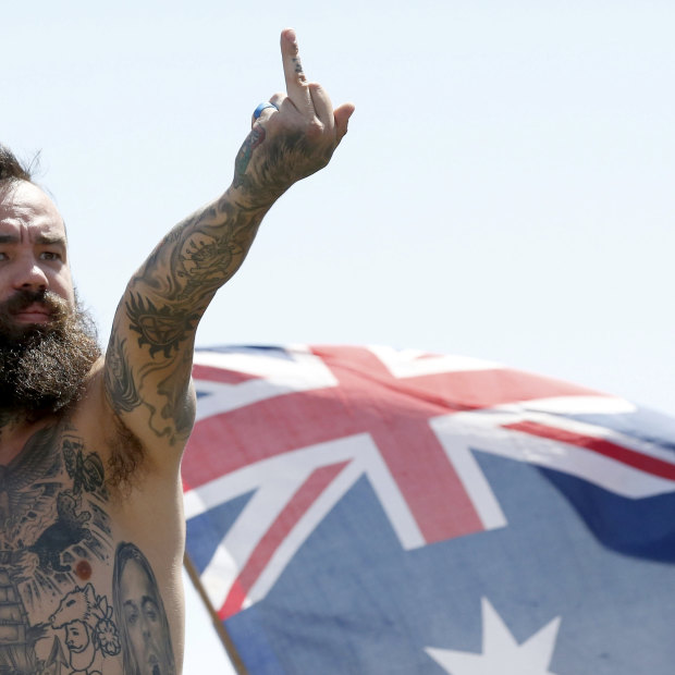 A protestor at a recent rally in St Kilda, which has thrown the spotlight on the far-right movement in Australia. 