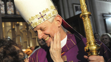 Cardinal Donald Wuerl, the Archbishop of Washington, greets a woman after giving a Mass of Thanksgiving at St Paul Cathedral in Oakland, Pittsburgh in 2010.