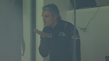 Panthers coach Ivan Cleary blowing kisses to a Wests Tigers fan after Saturday night's win against his old club.