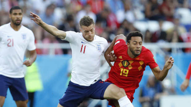 England's Jamie Vardy, left, and Belgium's Moussa Dembele during the group G match between England and Belgium on Thursday.