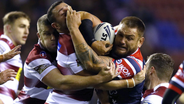 Sydney Roosters' Jared Waerea-Hargreaves charges the ball up against Wigan.