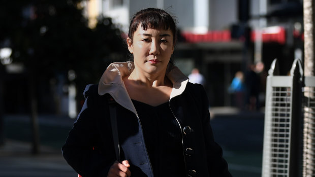 Yutian Li arrives at the District Court in Brisbane on Wednesday.