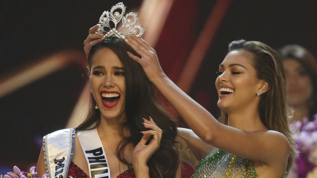 Catriona Gray of the Philippines reacts as she is crowned the new Miss Universe 2018 by Miss Universe 2017 Demi-Leigh Nel-Peters.