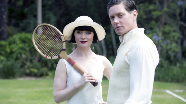 Davis with Nathan Page, who plays her love interest Detective Jack Robinson,  in a scene from Miss Fisher's Murder Mysteries.