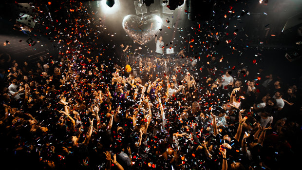 Hearts and glitter rain on the crowd at Mark Ronson's Club Heartbreak.