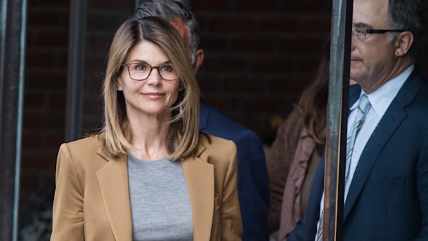 Actress Lori Loughlin leaves court after facing charges in the college admissions scandal.