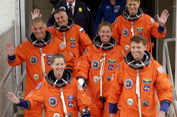 Pilot Pamela Melroy, front left, with the space shuttle Atlantis crew departing for the launch pad at the Kennedy Space Centre in Florida in October 2002.
