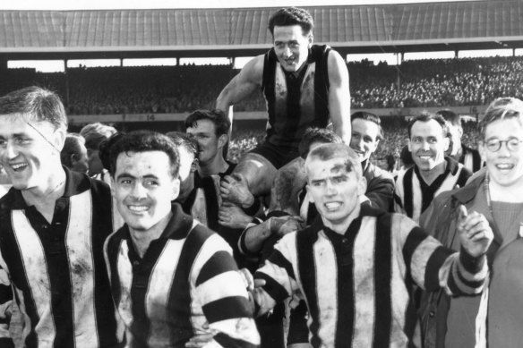Teammates carry Weideman off after Collingwood’s victory over Melbourne in the 1958 VFL grand final.